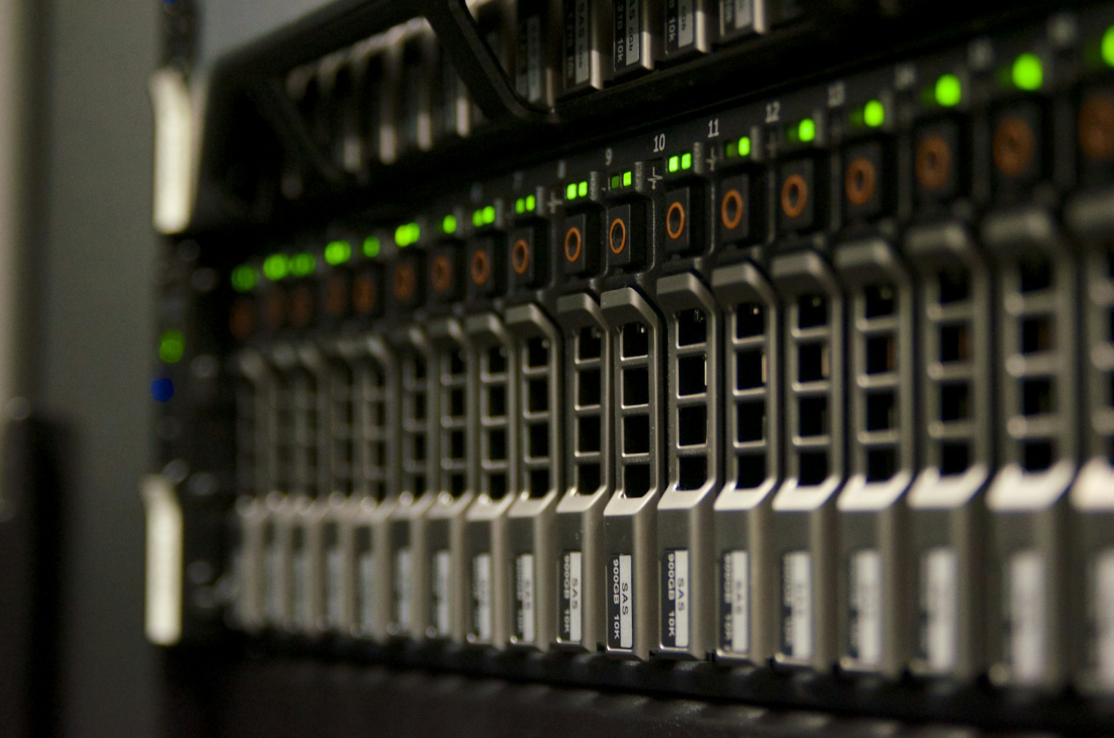Front-facing computer server rack with illuminated green status lights